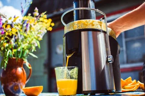 Preparation of juice from an orange Photos
