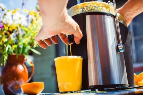 Preparation of juice from an orange Photos