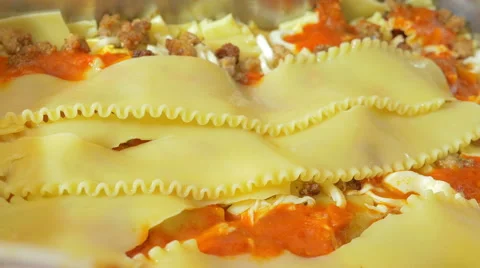 Preparation of lasagna before being baked Stock Footage