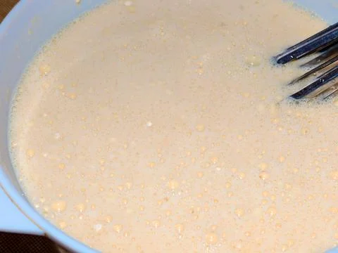 Preparation of liquid dough Foto stock