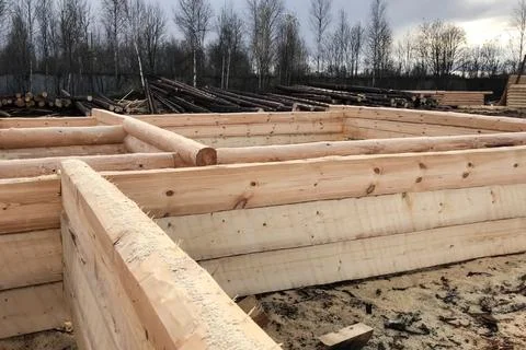 Preparation of logs for the assembly of structure. Materials for Stock Photos