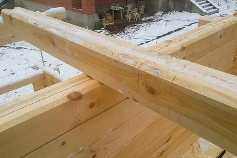 Preparation of logs for the assembly of structure. Materials for Stock Photos