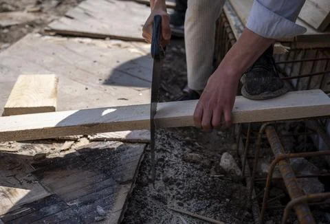 Preparation of material for foundation formwork  Stock Photos