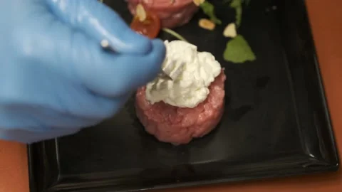 Preparation of meat tartare Stock Footage 205557707
