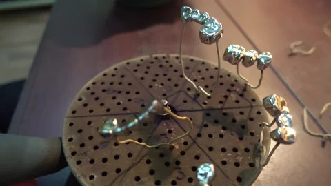 Preparation of Metallic Dental Prostheses for Ionic-Plasma Deposition Stock Footage 91666537
