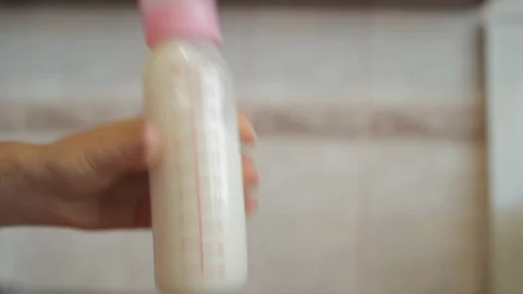 Preparation of nutritional formula for baby Stock Footage 88474130