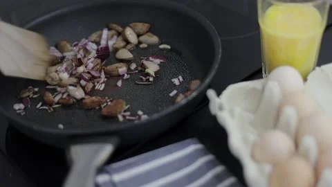 Preparation of an omelette for breakfast. Stock Footage 148930083
