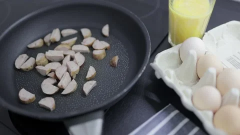 Preparation of an omelette for breakfast. Stock Footage 148930489