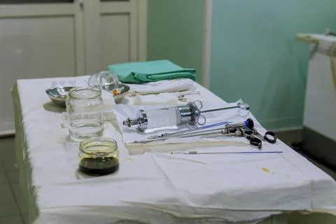 Preparation of operating tools during surgery involves sterilization procedures Stock Photos