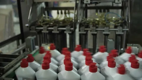 Preparation for Packaging of Finished Products. White jars with Household Chemic Stock Footage 197334806