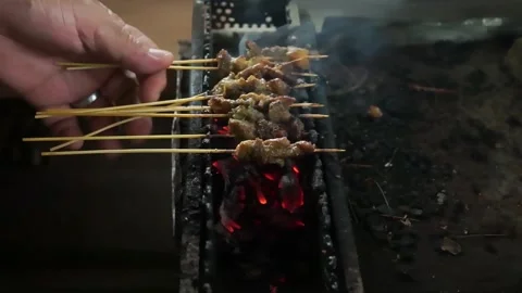 Preparation of the Padang satay dish Stock Footage 287702695