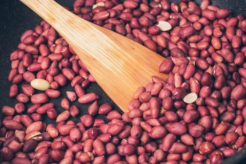 Preparation of peanuts as a source of vegetable protein. peanuts were fried i Stock Photos