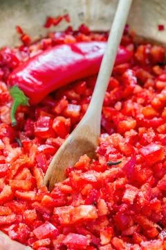 Preparation of pepper jam. Stock Photos