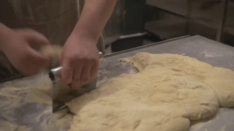 Preparation of pieces of raw dough for making bread Stock Footage 71539254