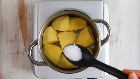Preparation potato in water Stock Footage 100635896