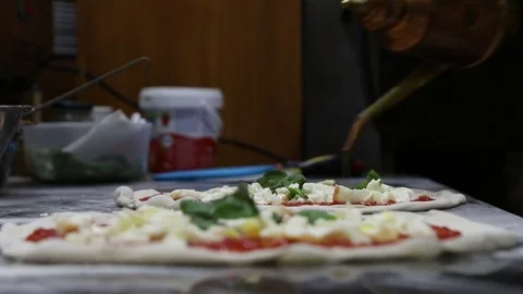 Preparation of a real Neapolitan pizza Stock Footage
