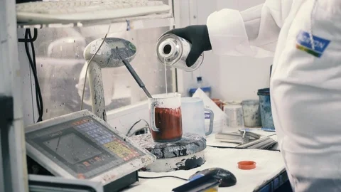 Preparation of red varnish Stock Footage 86238844