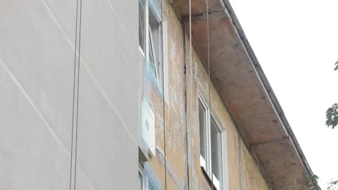 Preparation for repair work on the facade of the building Stock Footage 100553523