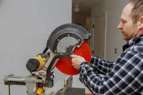 Preparation replace a saw in a electric circular saw Stock Photos