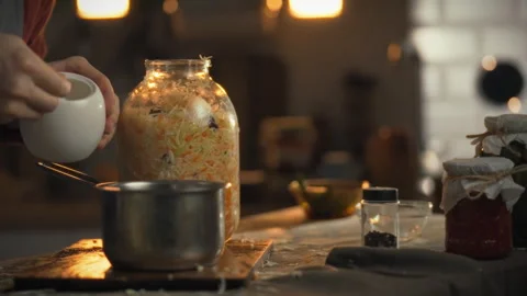 Preparation of rosol marinade for cabbage fermentation in a warm kitchen spa 스톡 동영상 331356405