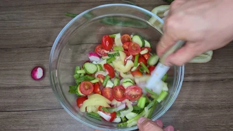 Preparation Of Salad. Cut Vegetables Stock Footage 165505323