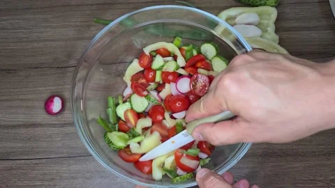 Preparation Of Salad. Cut Vegetables Stock Footage 165505350