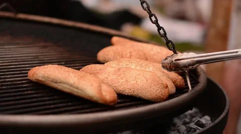 Preparation sandwiches with seasame on grill. Close up view Видео 59086361