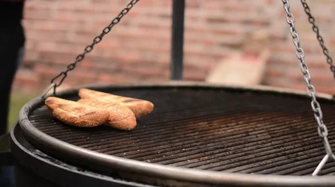 Preparation sandwiches with seasame on grill at outdoor Видео 59086380