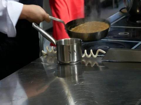 Preparation of the sauce in the pan. Stock Footage 81145424