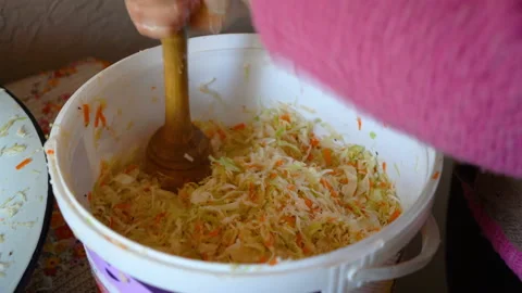 Preparation of sauerkraut Stock Footage 135638229