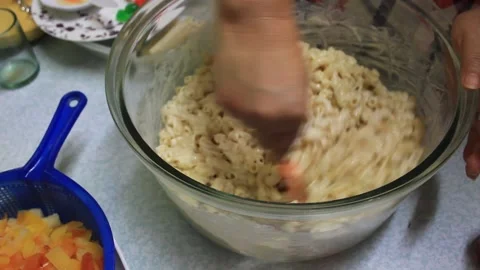Preparation for serving fresh mix with milk macaroni Stock Footage 224945164
