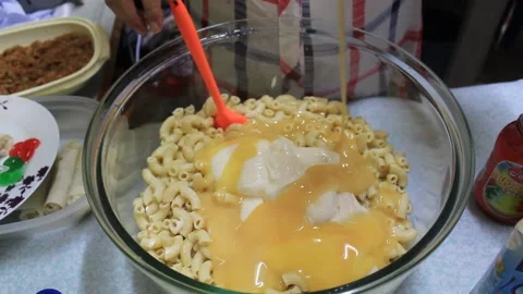 Preparation for serving fresh mix with milk macaroni Stock Footage 224945313