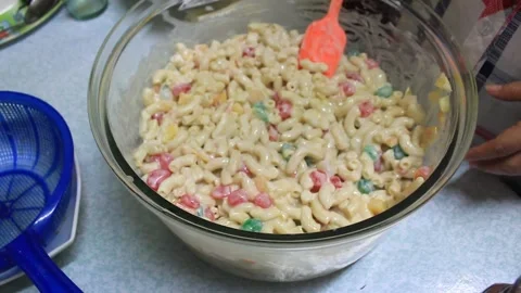 Preparation for serving fresh mix with milk macaroni Stock Footage 224945350