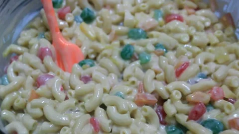 Preparation for serving fresh mix with milk macaroni Stock Footage 224945381