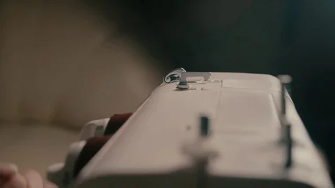 Preparation for sewing.thread spool unwinds Stock Footage 71296424