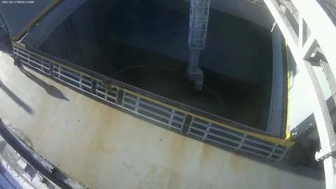 Preparation of the ship's hold for loading grain. laying of hoses for fumigation Stock Footage 154361251