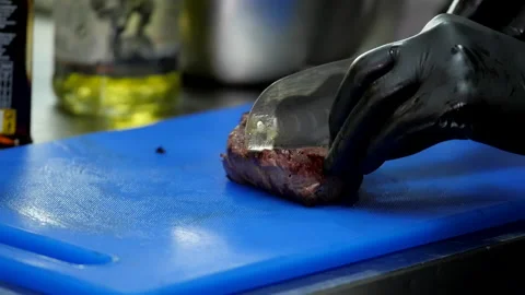 Preparation for Slicing Steak Stock Footage 132166370