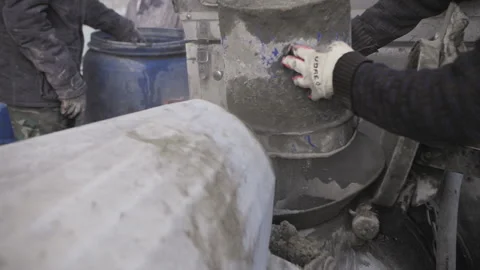 Preparation of a solution for floor screed Stock Footage 238683850