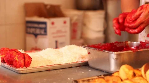 Preparation of strawberry and coconut bread called yoyo Stock Footage 130085538