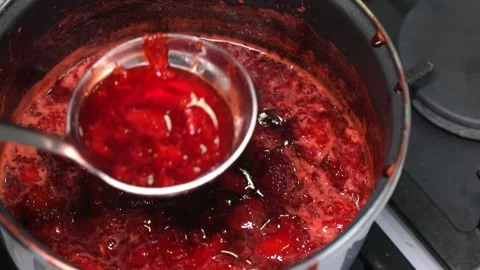 Preparation of strawberry jam Stock Footage 143699965