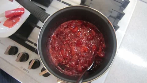 Preparation of strawberry jam Stock Footage 143700649
