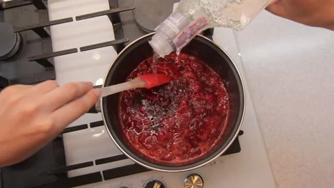 Preparation of strawberry jam Stock Footage 143707078