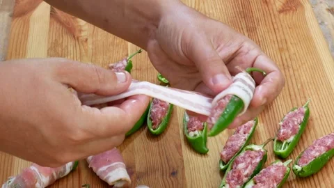 Preparation of stuffed peppers to be cooked on the barbecue Stock Footage 263982775