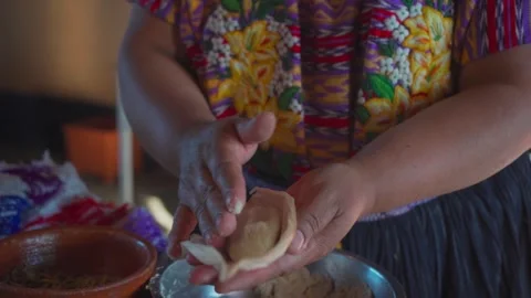 Preparation of a Tamale of Masa Stock Footage 293165779