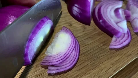 Preparation tasty fried scrambled eggs with yolk on fried onions in a skillet in Stock Footage 166335016