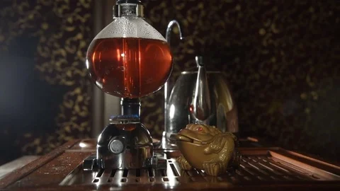 Preparation of tea in siphon Stock Footage 74450910