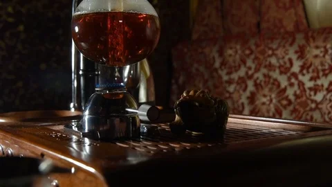 Preparation of tea in siphon Stock Footage 74450940