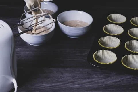 Preparation of the test for cupcakes. Stock Photos