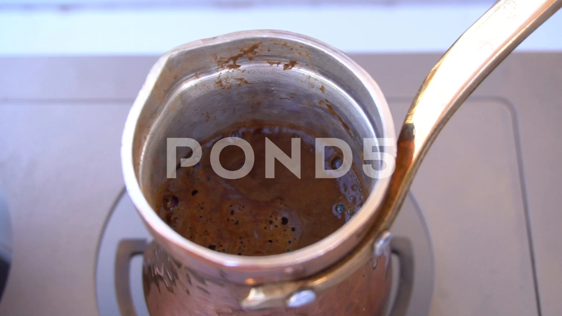 https://images.pond5.com/preparation-turkish-coffee-jezve-gas-footage-105812194_prevstill.jpeg