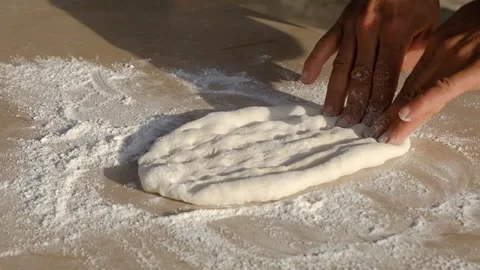 Preparation of Turkish style thin wrap bread by hand Stock Footage 242944630